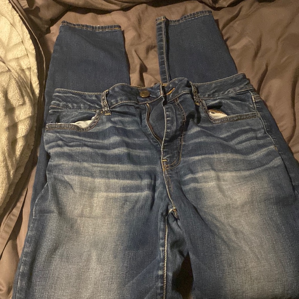 Dark wash American Eagle jeggings.